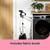 Garment steamer beside washing machine with fabric brush attachment