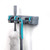 Grey wall-mounted mop holder with blue accents, holding two cleaning tools