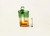 TALL CLEAR ACRYLIC RASTA COLORED DUGOUT WITH 3." LONG CIGARETTE HITTER