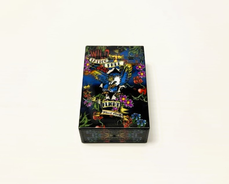 Ed Hardy hard case, vibrant design, premium feel, cigarette pack case, colorful pattern, black background.