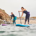 Red Paddle Ride 10'6" Inflatable Paddle Board Package Lifestyle_1