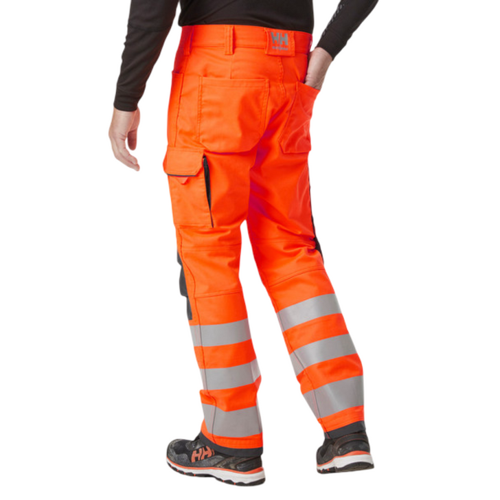 Helly Hansen Workwear Alna 2.0 Hi Vis Work Pants - Orange, model front