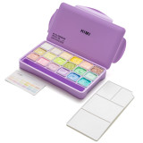 An 18 Piece Himi Pastel Jelly Cup Gouache Set in a Purple Case. An 18 Piece Himi Pastel Jelly Cup Gouache Set in a Purple Case.
