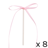 A set of 8 Light Pink Ribbon Bow Cake Toppers, manufactured by PME Cake.