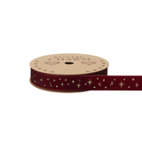 A spool of Dark Red Gold Foil Star Velvet Ribbon, measuring approx. 25mm x 10m. A spool of Dark Red Gold Foil Star Velvet Ribbon, measuring approx. 25mm x 10m.