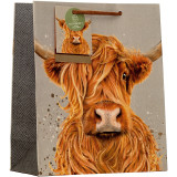 A Highland Cow Medium Gift Bag.