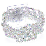 A Clear Iridescent Corsage Bracelet.