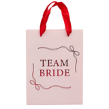 A set of 5 Team Bride Hen Party Bags, manufactured by Hootyballoo.