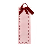 A Pink & Red Velvet Bow Bottle Bag.