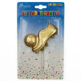 An 8 cm golden boot football candle, manufactured by Sensations.
