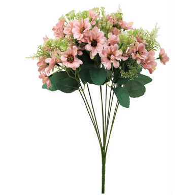 An artificial bunch of dusty pink daisies.