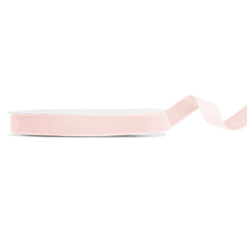 A spool of 15mm wide light pink velour ribbon, manufactured by PartyDeco. A spool of 15mm wide light pink velour ribbon, manufactured by PartyDeco.