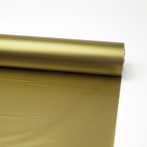 A roll of gold frosted film. A roll of gold frosted film.