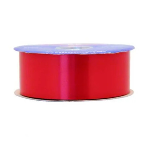 A spool of Super red florist ribbon A spool of Super red florist ribbon