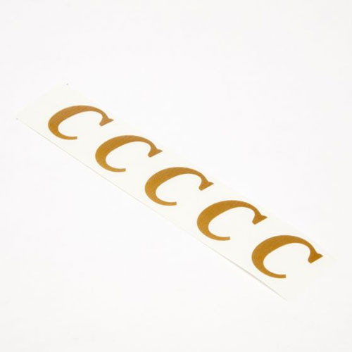 A pack of 20 gold vinyl letter "C"s