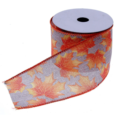 A roll of Orange/Brown Autumn Leaf Ribbon, measuring approx. 64mm x 10m! A roll of Orange/Brown Autumn Leaf Ribbon, measuring approx. 64mm x 10m!
