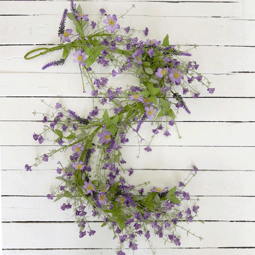 A Purple Meadow Garland, measuring approx. 1.3m. A Purple Meadow Garland, measuring approx. 1.3m.