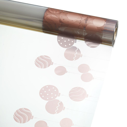 A Roll of Rose Gold Modern Bauble Clear Film, measuring 80cm x 100m. A Roll of Rose Gold Modern Bauble Clear Film, measuring 80cm x 100m.
