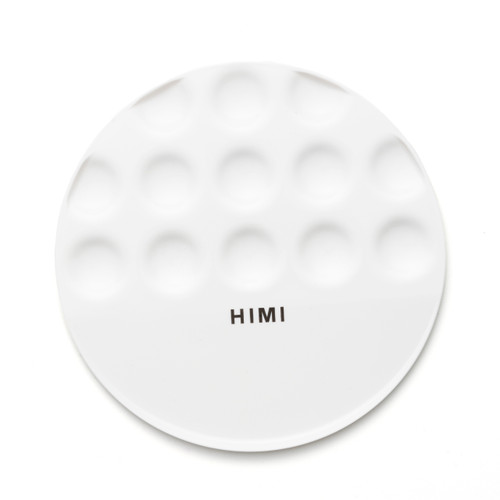 A Himi Round Paint Palette, measuring 18cm x 18cm. A Himi Round Paint Palette, measuring 18cm x 18cm.
