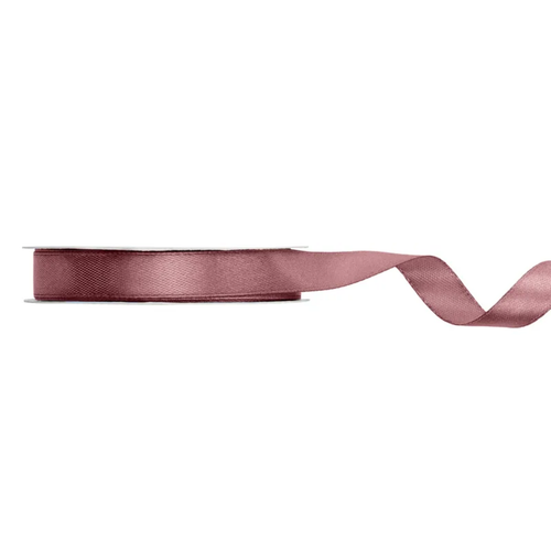 A spool of Dark Dusty Rose Satin Ribbon, measuring approx. 12mm x 25m. A spool of Dark Dusty Rose Satin Ribbon, measuring approx. 12mm x 25m.