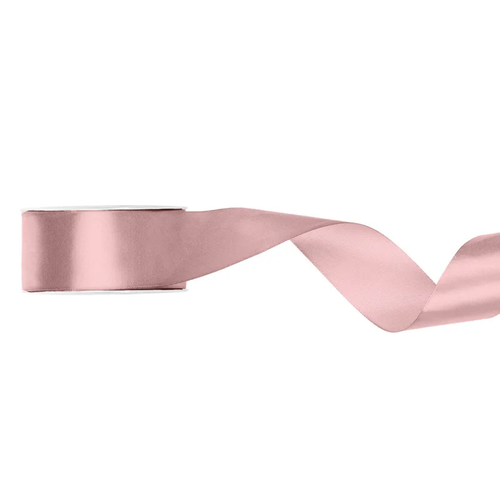 A spool of Light Dusty Rose Satin Ribbon, measuring approx. 25mm x 25m. A spool of Light Dusty Rose Satin Ribbon, measuring approx. 25mm x 25m.