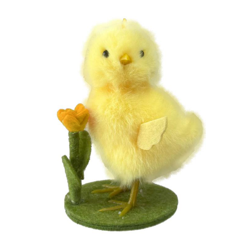 A Chick with Yellow Flower Decoration, measuring approx. 10.5cm.