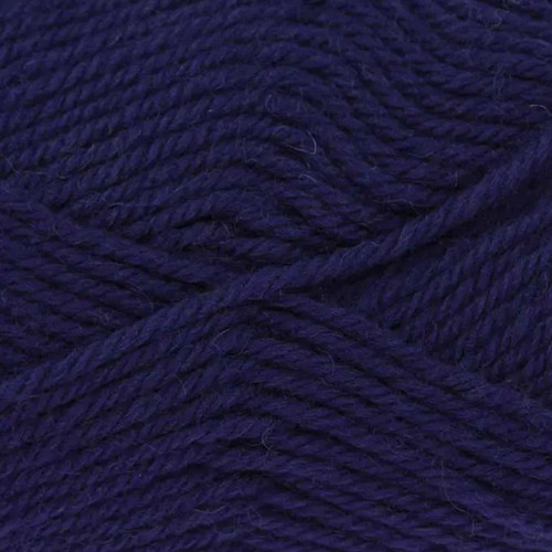 A 50g ball of Merino Blend DK French Navy Wool, manufactured by King Cole.