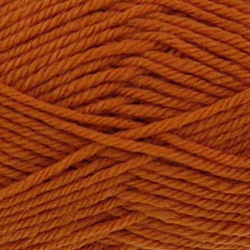 A 50g ball of Merino Blend DK Cinnamon Wool, manufactured by King Cole.
