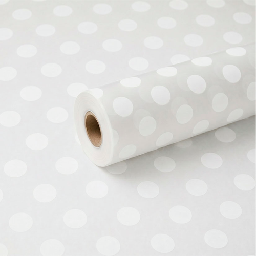 A roll of White Spotted Frosted Film, measuring approx. 80cm x 80m.
