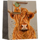 A Highland Cow Medium Gift Bag.