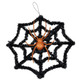 A 30cm Orange & Black Spider Web Decoration.