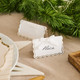 A pack of 8 White & Gold Wavy Edge Place Cards with Velvet Bows.