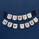 A Happy New Year Card Banner with Black Velvet Bows.