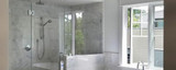 What Glass and Hardware Are Needed for An In-Line Shower Enclosure?