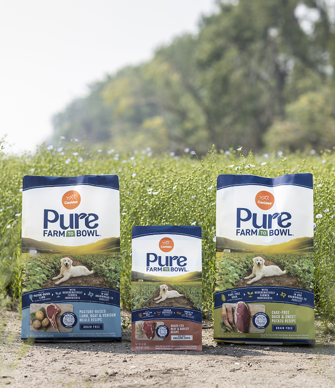 Lush green farm field under a cloudy sky