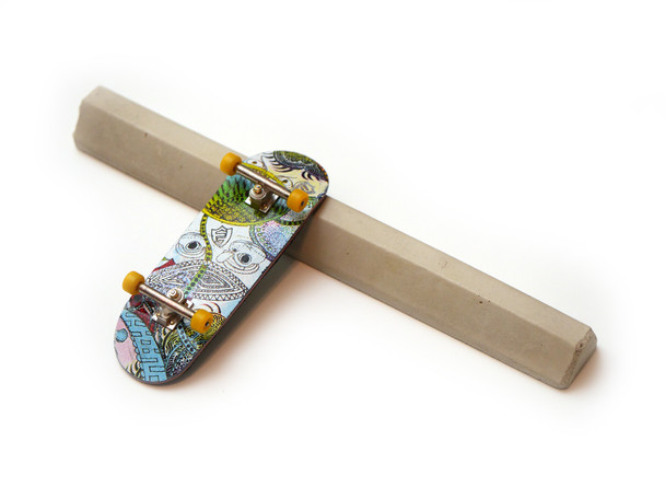 Klotz Block, shown with a fingerboard for size comparison.