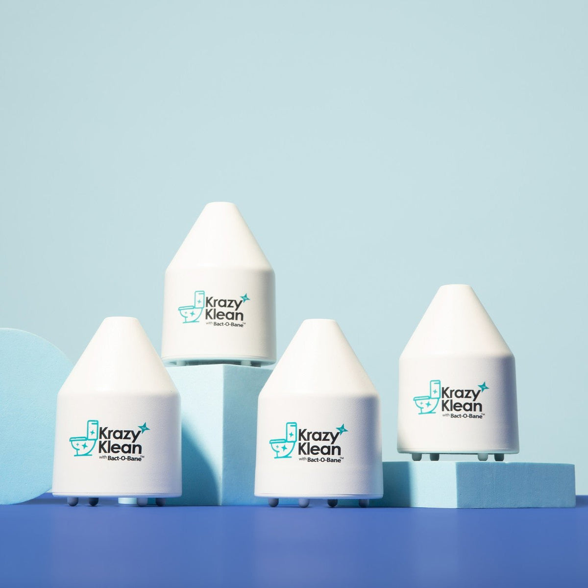 Krazy Klean 4-pack of drop-in toilet cleaner capsules on a blue background