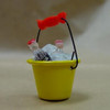 Yellow bucket filled with cola bottles and ice