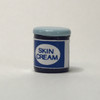 Miniature jar of skin cream