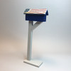 Patriotic mailbox with distressed flag roof