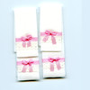 White dollhouse towels with pink ribbons