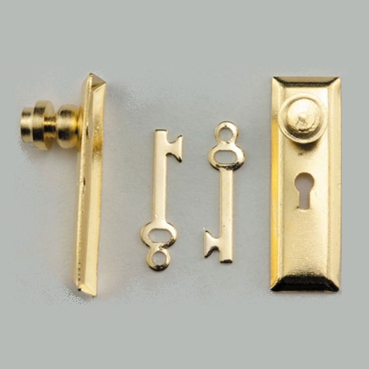 View of brass door knob set package contents