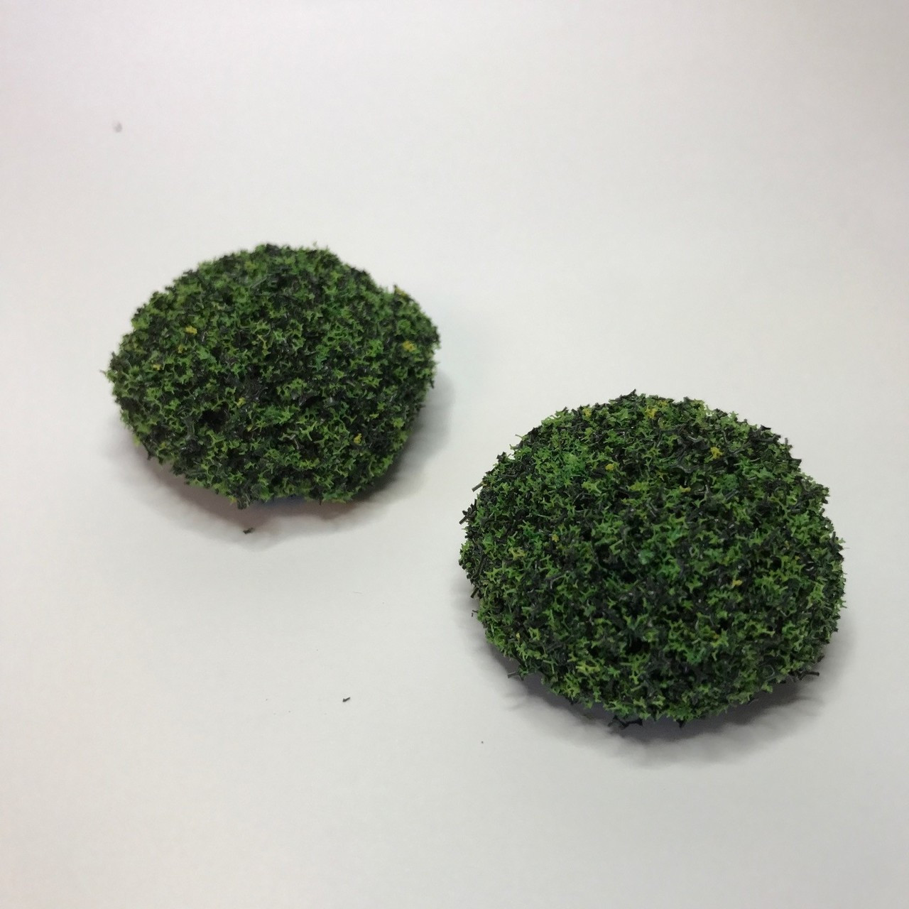 Image of two mound bushes for dollhouse landscaping