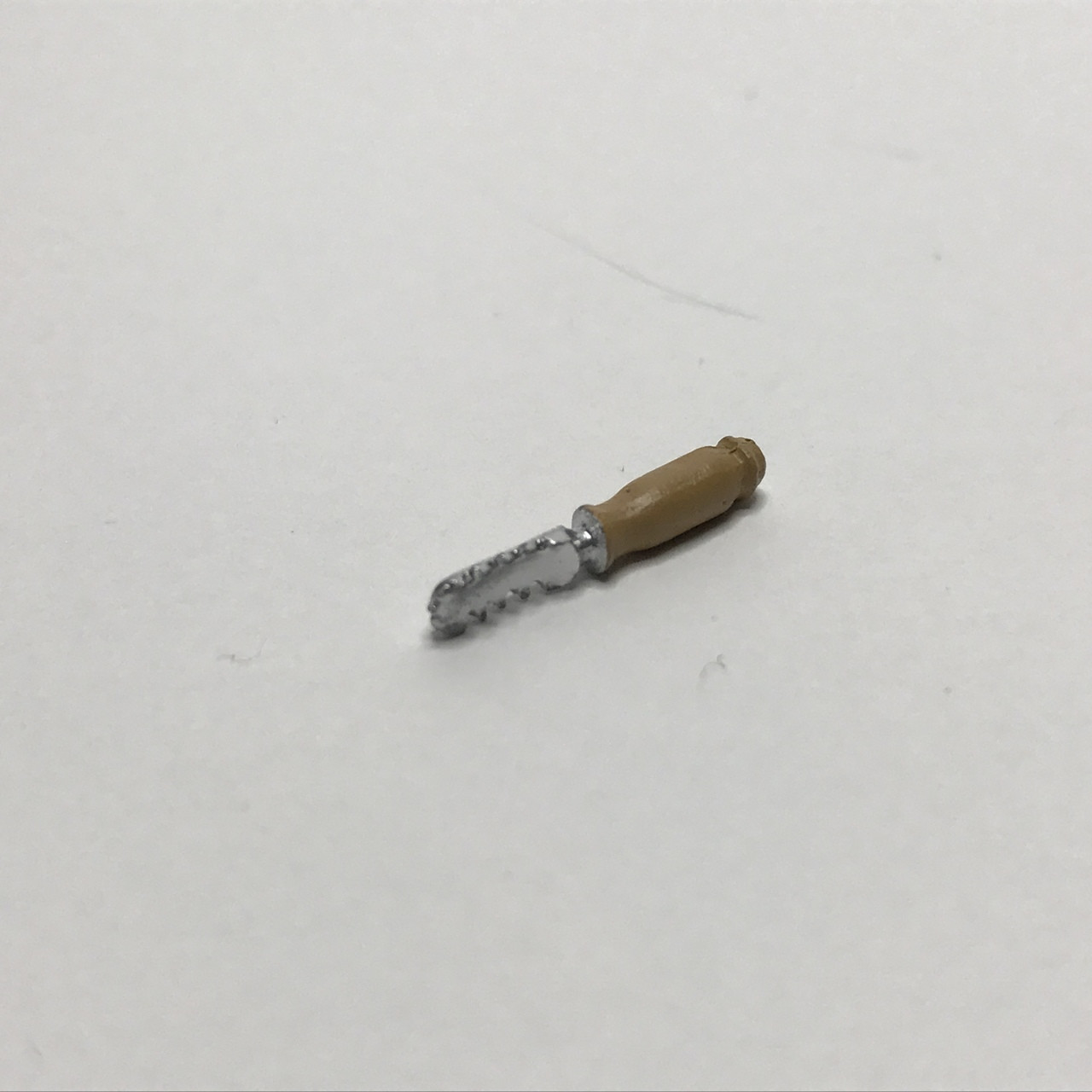 Miniature fish scaling tool