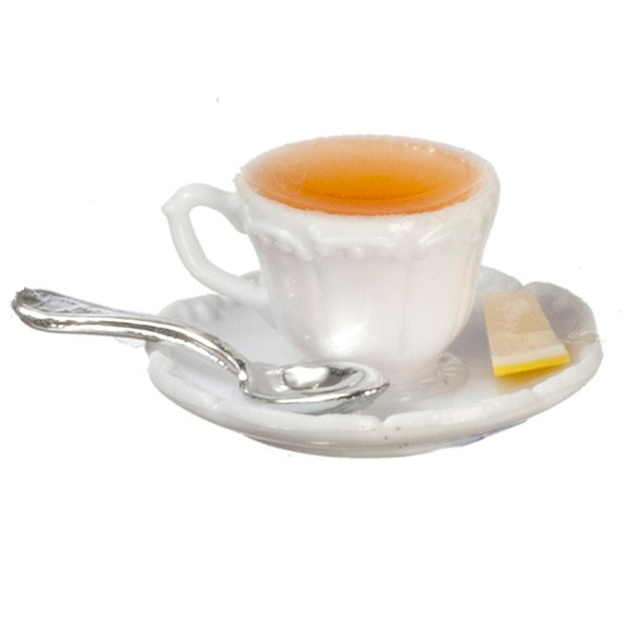 Image of hot tea in coffee cup with lemon slice and spoon on saucer