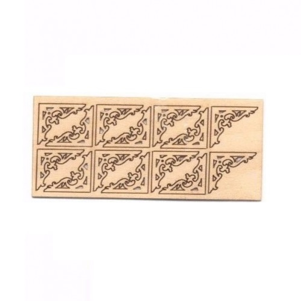 Miniature fretwork pieces shown in frame as shipping