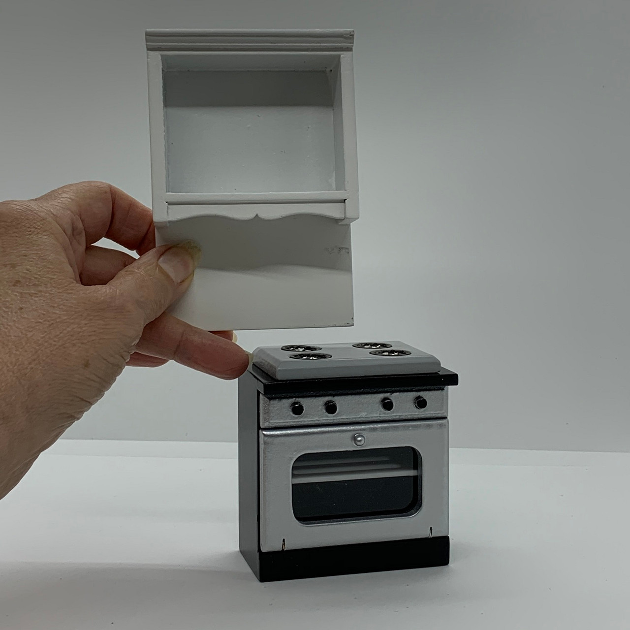 Dollhouse Miniature Oven with White Shelf (AZT5444); with shelf shown in hand