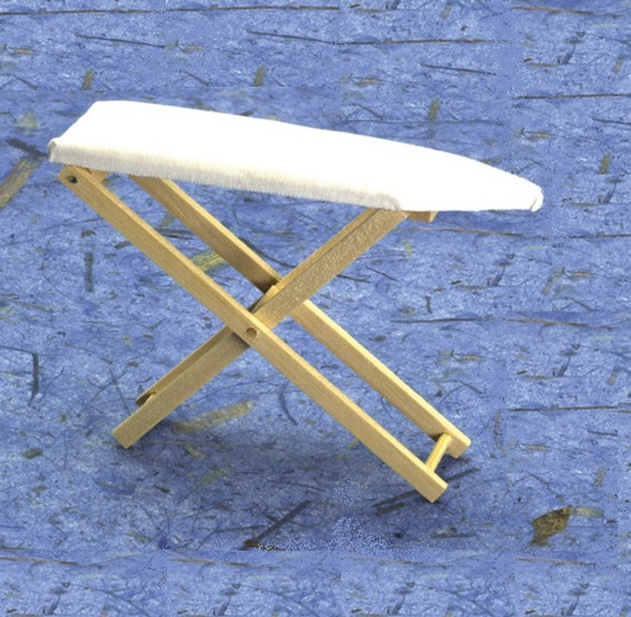 Dollhouse Miniature Covered Ironing Board (FCA2230) against blue background