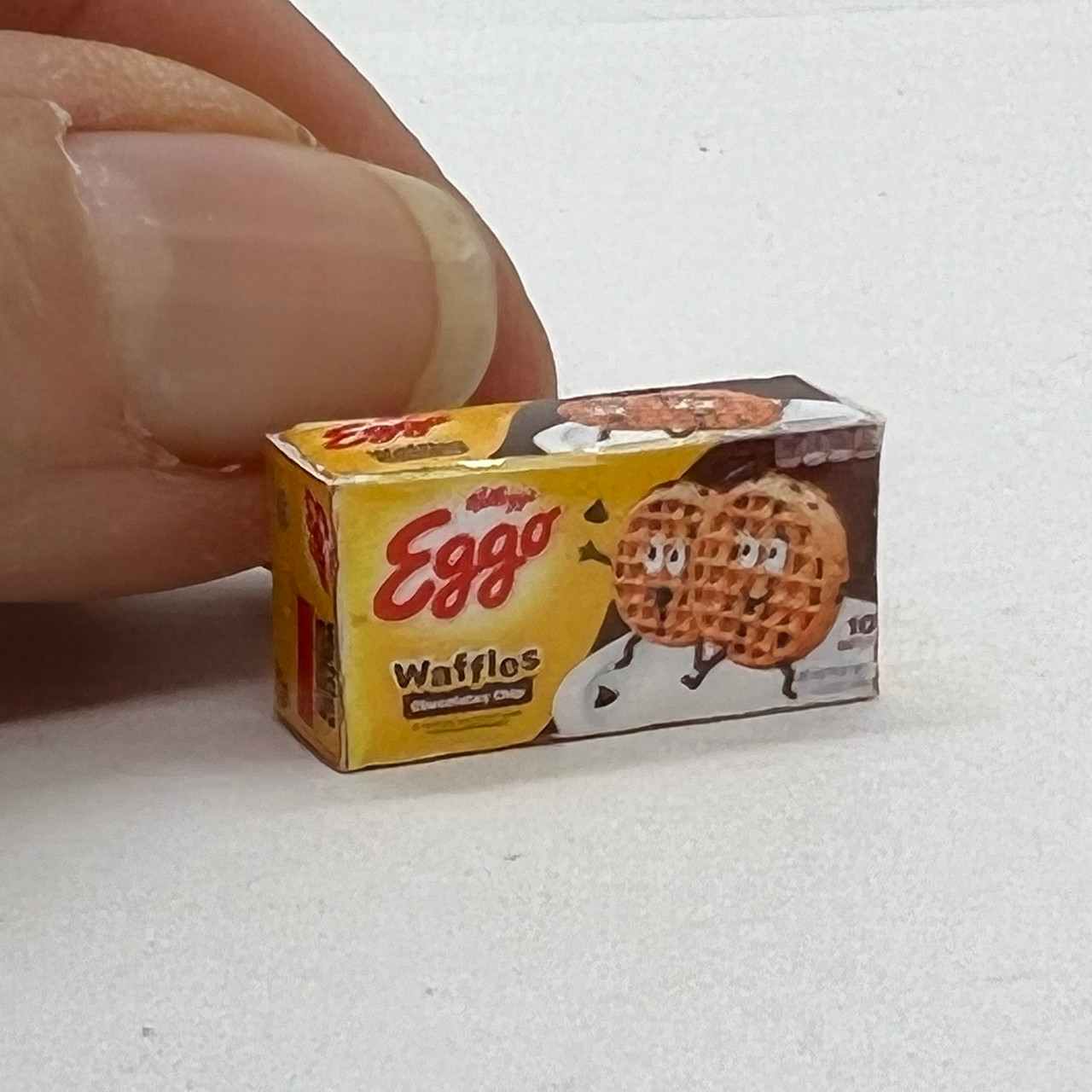 Eggo Waffles (CIMIG4632) with fingers for scale