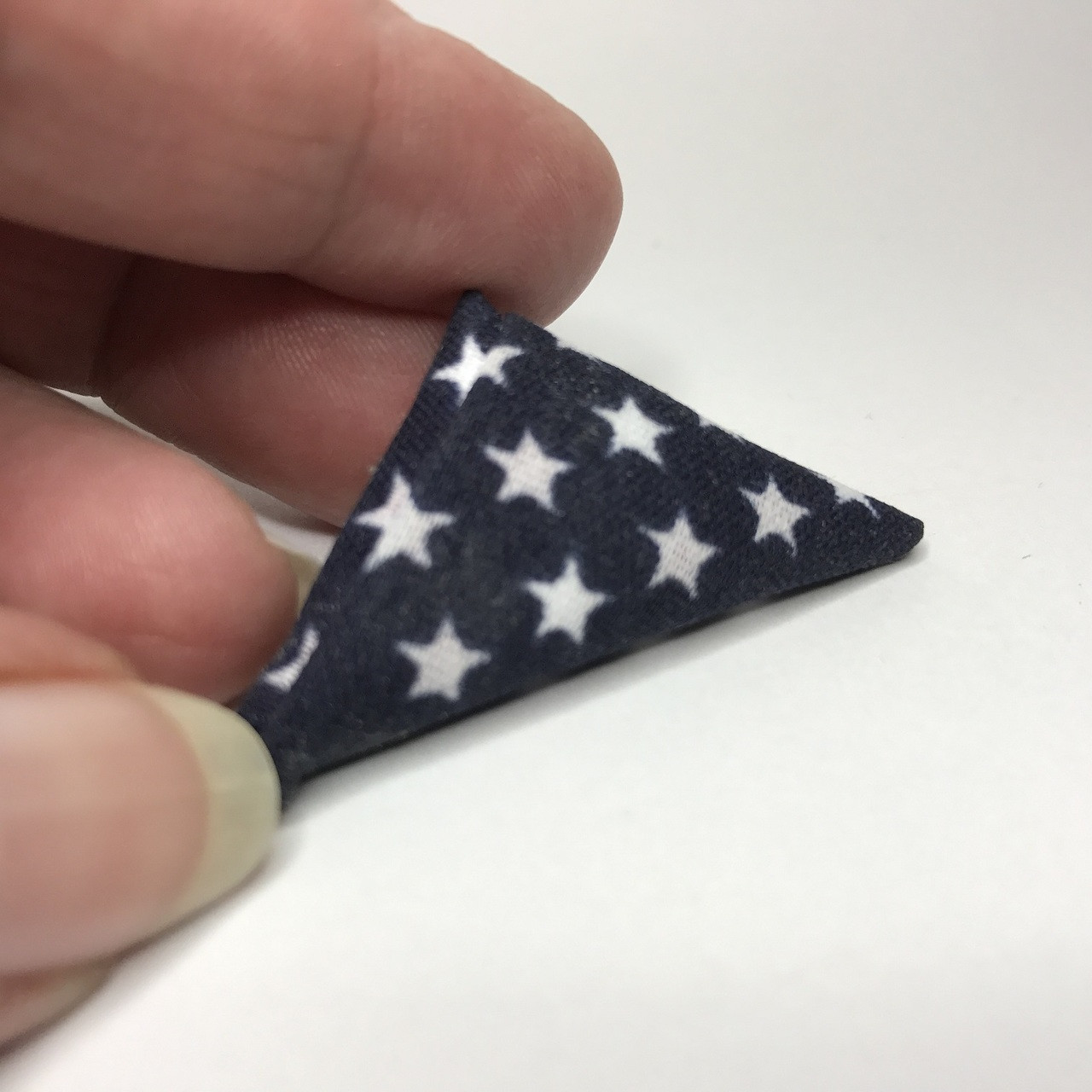 Miniature folded American flag